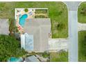 Aerial view showcasing the pool, backyard, and overall property layout at 1560 Bel Keene Dr, Clearwater, FL 33756