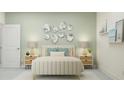 Bright bedroom with light walls and stylish decor at 18429 Serene Lake Loop, Lutz, FL 33548