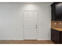 Bright interior with white door and complementary color palette at 4734 Chatterton Way, Riverview, FL 33578
