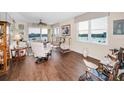 Bright living room with floor-to-ceiling windows offering panoramic water views at 7882 Sailboat Key S Blvd # 508, South Pasadena, FL 33707
