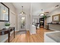 Bright foyer with hardwood floors and a view of the office space at 1235 Willowick Cir, Safety Harbor, FL 34695