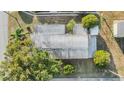 Aerial view shows the home's roof and surrounding greenery at 37321 8Th Ave, Zephyrhills, FL 33542