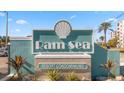 Ram Sea Resort Condominiums sign with lush landscaping at 17200 Gulf Blvd # 302, North Redington Beach, FL 33708