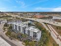 Scenic aerial view of the condo building close to bridges, the river and Tampa's vibrant cityscape at 201 W Laurel St # 909, Tampa, FL 33602