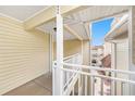 Balcony view with white railings overlooking the complex at 1000 W Horatio St # 327, Tampa, FL 33606