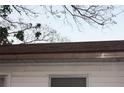 Exterior shot of a home's roof, showing a roof in need of repairs at 10554 116Th N Ave, Largo, FL 33773