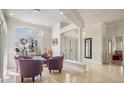 Bright foyer with high ceilings, decorative columns and plenty of natural light at 1123 Hounds Run, Safety Harbor, FL 34695