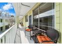 A relaxing outdoor patio area with comfortable seating is outside Unit 10 at 1301 S Howard Ave # C10, Tampa, FL 33606