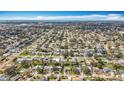 Wide aerial shot of a densely populated suburban area, highlighting numerous houses and community layouts at 3124 61St N Ln, St Petersburg, FL 33710