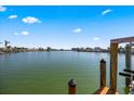 Scenic water view showcasing a serene waterway and residential waterfront properties at 448 79Th S St, St Petersburg, FL 33707