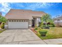 This is a nice single Gathering home that features a two car garage and mature landscaping at 6208 Forrestal Dr, Tampa, FL 33625