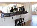 Kitchen counter seating, perfect for entertaining, with view of the kitchen at 6287 Bahia Del Mar Cir # 101, St Petersburg, FL 33715