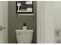 Cozy powder room featuring modern decor, a white toilet, and a neutral color scheme for a simple design at 6857 E 115Th St, Palmetto, FL 34221