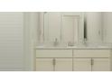 Bright bathroom featuring double sinks, a modern vanity with granite countertop, and subway tile in shower at 9705 Runaway Breeze Dr, Land O Lakes, FL 34637