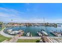 Scenic view of a marina showcasing multiple boats docked along the waterway at 51 Island Way # 308, Clearwater Beach, FL 33767