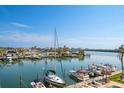 Beautiful marina view showcasing boats, surrounding waterways, and clear blue skies at 51 Island Way # 308, Clearwater Beach, FL 33767