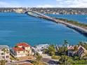 Waterfront property offering breathtaking views of the bay and the bridge with easy access to Tampa and the beaches at 1201 Bay Dr, Belleair Beach, FL 33786