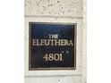 Close-up of a decorative plaque showing the building name and address: The Eleuthera 4801 at 4801 Osprey S Dr # 209, St Petersburg, FL 33711