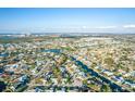 A wide aerial shot showcasing waterfront living in a community with canal access at 625 Kingston Ct, Apollo Beach, FL 33572