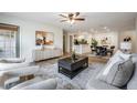 Open-concept living space featuring modern decor and an adjacent dining area at 846 Normandy Trace Rd, Tampa, FL 33602