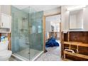 Bathroom featuring tiled floors and a glass shower ready for renovation at 120 148Th E Ave, Madeira Beach, FL 33708