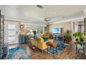 Comfortable living area with hardwood floors, stylish furnishings, and ample natural light at 2851 66Th N Way, St Petersburg, FL 33710
