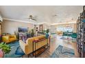 Spacious living area with hardwood floors and an abundance of natural light at 2851 66Th N Way, St Petersburg, FL 33710