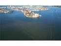 Stunning aerial view of an exclusive waterfront community with private docks at 561 173Rd E Ave, North Redington Beach, FL 33708