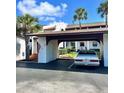 Attached carport parking area for residences at 7623 Radcliffe Cir # 211A, Port Richey, FL 34668