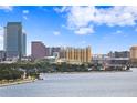 Stunning cityscape featuring modern architecture with a waterfront vista under a sunny, blue sky at 3301 Bayshore Blvd # 1908B, Tampa, FL 33629