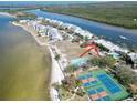 Beautiful waterfront property with easy beach access, pool, and tennis courts for outdoor activities at 611 Destiny Dr # 604, Ruskin, FL 33570