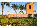 Cory Lake Isles community entrance with lush landscaping and signature signage at 10534 Bermuda Isle Dr, Tampa, FL 33647