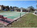 Well-maintained shuffleboard courts offering a recreational space for residents and guests at 1 Quails Run Blvd # 2, Englewood, FL 34223