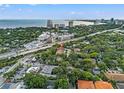 Gorgeous aerial view of the city, showcasing lush greenery and beautiful waterfront views at 1118 S Moody Ave, Tampa, FL 33629
