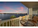 Enjoy this waterfront view from the balcony with a table and chairs for relaxing and entertaining at 500 Treasure Island Cswy # 308, Treasure Island, FL 33706