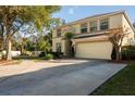Charming two-story home with a two-car garage and a well-manicured lawn at 732 June Lake Ln, Brandon, FL 33510