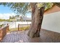 Outdoor deck featuring a beautiful mature tree at 1801 E Mcberry St, Tampa, FL 33610
