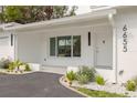 Attractive home featuring a modern facade, manicured landscaping, and welcoming entrance at 6655 Colony S Dr, St Petersburg, FL 33705