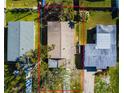 Birds eye view of single-story home, showcasing the roof, trees, and the property boundaries at 1826 Nevada Ne Ave, St Petersburg, FL 33703