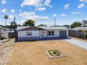 Charming single-story home with neutral paint, brick accents, and a one car garage at 3246 Thorny Ridge Dr, Holiday, FL 34691