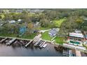 Aerial view showcases the property's waterfront location and private boat docks for easy access to the water at 10501 Bridgewood Dr, Riverview, FL 33578