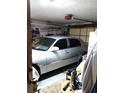 Attached garage with a car parked inside at 39349 & 39343 Rusbe Dr, Zephyrhills, FL 33540