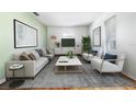 Spacious living area with a large rug, contemporary decor, and ample natural light from the window at 4408 W Lackland Pl, Tampa, FL 33616