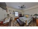 Bedroom featuring a fan and a window for natural light at 6017 Portsdale Pl # 101, Riverview, FL 33578