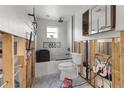 Modern bathroom renovation featuring a new tub with glass, sleek fixtures, and stylish tile work at 1859 Nevada Ne Ave, St Petersburg, FL 33703