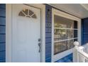 Close up of the front door and house numbers at 5502 N 9Th St, Tampa, FL 33604