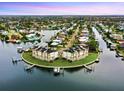 Waterfront townhomes offer modern design and boat docks for coastal living at 774 Gran Kaymen Way, Apollo Beach, FL 33572