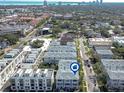 Beautiful aerial view of townhomes in a desirable neighborhood, with skyline views and lush landscaping at 2510 W Cleveland St # 3, Tampa, FL 33609