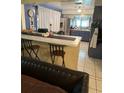 Eat-in kitchen features ample counter space and stainless steel appliances at 6223 12Th S St, St Petersburg, FL 33705