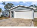 Home with a two car garage and nicely landscaped yard at 9394 117Th Ave, Largo, FL 33773